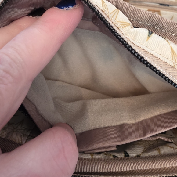 Lug Ranger Mini Crossbody Bag in a mauve or cappuccino color. - Picture 4 of 9